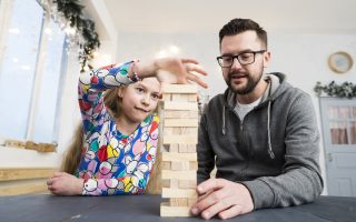 Best board games for 2024: father daughter enjoying board games