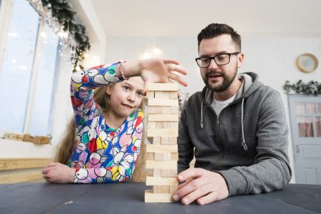 Best board games for 2024: father daughter enjoying board games